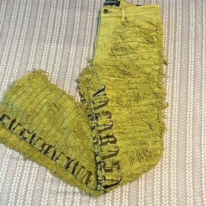 The jeans feel stacked and thick, made of 98% cotton and 2% spandex red stain